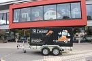 Bakwagen met bedrukte huif