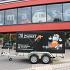 Bakwagen met bedrukte huif