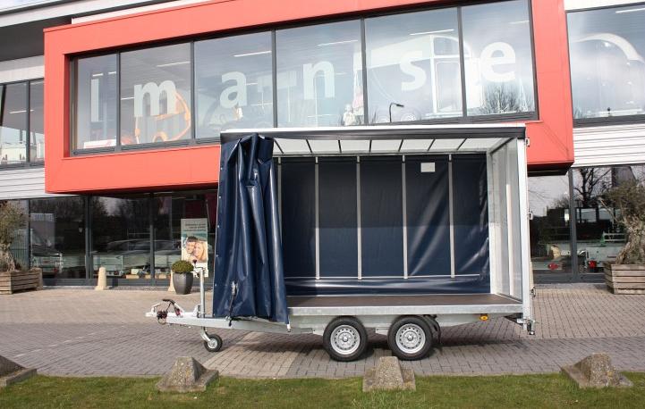 Plateauwagen met schuifhuifzeil